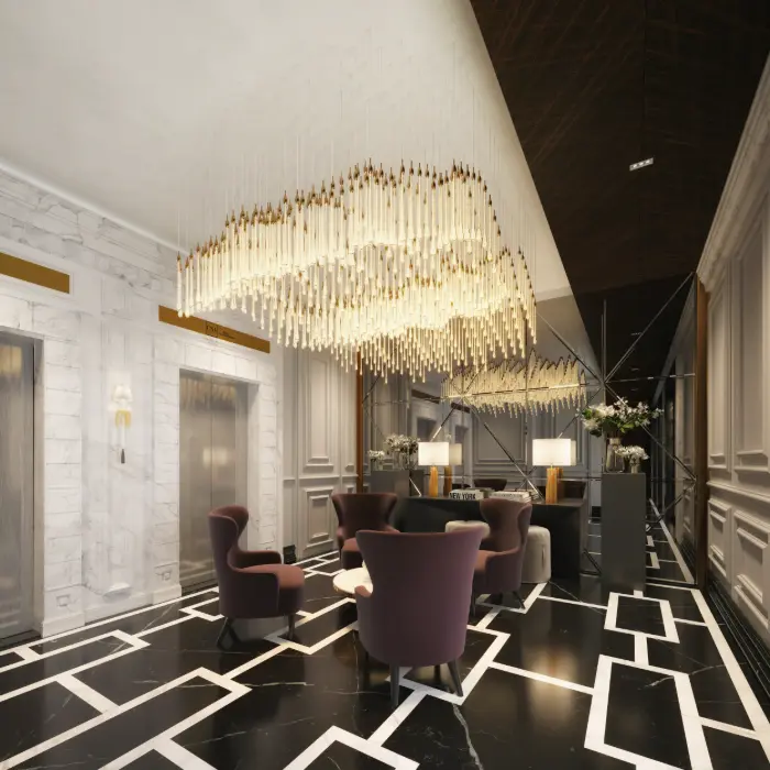 Lounge do hall com lustre e poltronas
